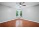 Bedroom has wood floors and sunny corner view at 175 River Run, Roswell, GA 30075