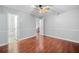 Bedroom with wood floor and ensuite bathroom at 175 River Run, Roswell, GA 30075
