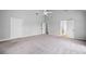 Large Primary bedroom with carpet floors and multiple closets at 175 River Run, Roswell, GA 30075