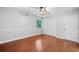 Bedroom with wood floor, closet, ceiling fan and big window at 175 River Run, Roswell, GA 30075