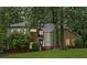 Charming two-story home with brick accents and ample windows surrounded by green grass at 175 River Run, Roswell, GA 30075