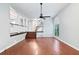 Spacious living room with hardwood floors, staircase, and open floor plan at 175 River Run, Roswell, GA 30075