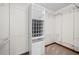 Walk-in closet has shelving for all your storage needs at 175 River Run, Roswell, GA 30075