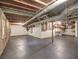 Unfinished basement showing mechanicals, support beam, and concrete flooring at 351 Ridgewater Dr, Marietta, GA 30068