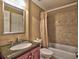Updated bathroom featuring a granite countertop vanity and shower with tile surround at 351 Ridgewater Dr, Marietta, GA 30068