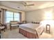 Bedroom with a bed, seating bench and antique furniture, and neutral-toned carpet at 351 Ridgewater Dr, Marietta, GA 30068
