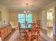 Elegant dining room with ample seating, natural light and access to kitchen at 351 Ridgewater Dr, Marietta, GA 30068