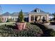 Beautiful exterior view with manicured landscaping, fountain, and well-maintained building facade at 351 Ridgewater Dr, Marietta, GA 30068