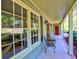 Inviting covered front porch with decorative black shutters and updated trim at 351 Ridgewater Dr, Marietta, GA 30068