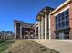 Exterior of Walton High School with modern architecture, tall windows, and manicured lawn at 351 Ridgewater Dr, Marietta, GA 30068