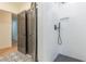 Bathroom with subway tile shower and matte black hardware and geometric tile floor at 418 Mockingbird, Smyrna, GA 30082