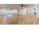 Large living room features hardwood floors, recessed lighting, and view of the kitchen at 418 Mockingbird, Smyrna, GA 30082