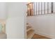 This is a staircase with wood and iron railings leading up to the second floor at 418 Mockingbird, Smyrna, GA 30082