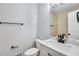 Stylish bathroom featuring modern fixtures, granite vanity, and tile accents, offering a spa-like experience at 8914 Gardener Dr, Jonesboro, GA 30238