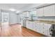 Contemporary kitchen featuring granite countertops, stainless steel appliances, and natural light at 8914 Gardener Dr, Jonesboro, GA 30238