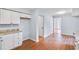 Spacious eat-in kitchen with pantry and granite countertops that flow into other rooms at 8914 Gardener Dr, Jonesboro, GA 30238