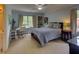 Comfortable bedroom with desk and bookshelf, offering a cozy and functional living space at 1043 Elizabeth Ne Ct, Atlanta, GA 30306