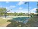 Well-maintained community basketball court with lighting for evening play at 2485 Millwater Xing, Dacula, GA 30019