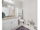 Bathroom featuring white cabinets, granite counters, and a neutral color palette at 2485 Millwater Xing, Dacula, GA 30019