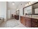 Spacious bathroom with double vanities, bath tub, and elegant fixtures at 2485 Millwater Xing, Dacula, GA 30019