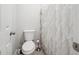 Cozy bathroom featuring a toilet and decorative white ruffled shower curtain at 2485 Millwater Xing, Dacula, GA 30019