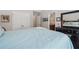 Bedroom with neutral walls, carpet floors, and a spacious closet at 2485 Millwater Xing, Dacula, GA 30019