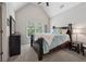 Vaulted bedroom featuring carpet floors, neutral walls, and large windows at 2485 Millwater Xing, Dacula, GA 30019