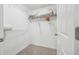 A walk-in closet with wire shelving and carpet flooring at 2485 Millwater Xing, Dacula, GA 30019
