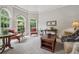 Comfortable living room with natural light and traditional furnishings at 2485 Millwater Xing, Dacula, GA 30019