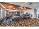 Inviting lobby with custom ceiling, elegant seating area, and a fireplace at 2485 Millwater Xing, Dacula, GA 30019