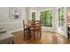 Cozy breakfast nook filled with natural light and a view of the lush greenery at 3267 Standing Peachtree Nw Trl, Kennesaw, GA 30152