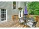 A view of the home's wood deck and outdoor furniture at 3267 Standing Peachtree Nw Trl, Kennesaw, GA 30152