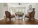 Spacious living room featuring hardwood floors, a fireplace, and comfortable seating at 3267 Standing Peachtree Nw Trl, Kennesaw, GA 30152