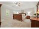 This main bedroom features a ceiling fan and two windows to allow for natural light at 3267 Standing Peachtree Nw Trl, Kennesaw, GA 30152