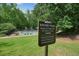 Nature trail sign leading to an 8 acre wooded area, a peaceful escape in an undisturbed park at 3267 Standing Peachtree Nw Trl, Kennesaw, GA 30152