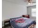 Cozy bedroom featuring a ceiling fan, laminate floor, and a comfortable bed with side tables at 4240 Summer Breeze Way, Buford, GA 30518