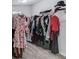 Walk-in closet featuring clothing racks, shelves, and ample storage space at 4240 Summer Breeze Way, Buford, GA 30518