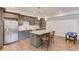 Kitchen includes stainless steel appliances, granite counters, and a center island at 4240 Summer Breeze Way, Buford, GA 30518