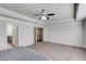 Spacious main bedroom with carpet, tray ceiling, and access to the Primary bathroom and walk in closet at 4240 Summer Breeze Way, Buford, GA 30518