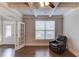 Cozy office features natural light, hardwood floors, coffered ceiling, and direct access to the exterior at 4240 Summer Breeze Way, Buford, GA 30518
