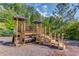 Community playground with slides, climbers, and shaded seating areas, perfect for fun at 4240 Summer Breeze Way, Buford, GA 30518