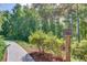 Scenic walking trail surrounded by lush greenery, offering a tranquil outdoor experience at 4240 Summer Breeze Way, Buford, GA 30518