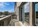A charming balcony with wooden railings overlooks scenic outdoor views at 533 Rubato Knl, Mcdonough, GA 30253