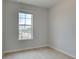Bright bedroom with large window, perfect for natural light and peaceful rest at 533 Rubato Knl, Mcdonough, GA 30253