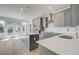 Modern kitchen boasts stainless steel appliances, a large island, and plenty of counter space at 533 Rubato Knl, Mcdonough, GA 30253
