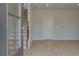 Open concept living area with light wood floors, neutral paint, and staircase, offering a modern design at 533 Rubato Knl, Mcdonough, GA 30253