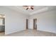 Spacious main bedroom featuring hardwood floors, ceiling fan, and an en-suite bathroom at 533 Rubato Knl, Mcdonough, GA 30253
