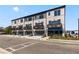 Beautiful townhomes with garages, balconies, and manicured landscaping enhance this neighborhood at 533 Rubato Knl, Mcdonough, GA 30253