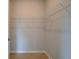 Walk-in closet with wire shelves for efficient storage and organization at 533 Rubato Knl, Mcdonough, GA 30253