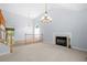 Bright living room with vaulted ceilings, fireplace, and hardwood floors at 9206 Denmeade Trce, Douglasville, GA 30135